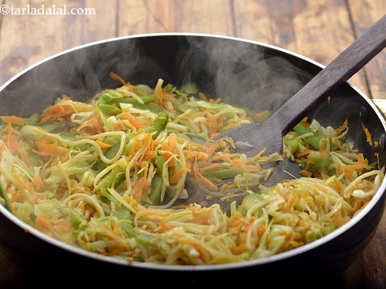 Step 11 – Mix well and cook on a high flame for 3 minutes, while stirring occasionally.