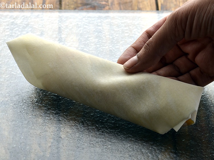 Step 22 – Finally roll it completely. Roll it tightly without leaving any space that would absorb excess …