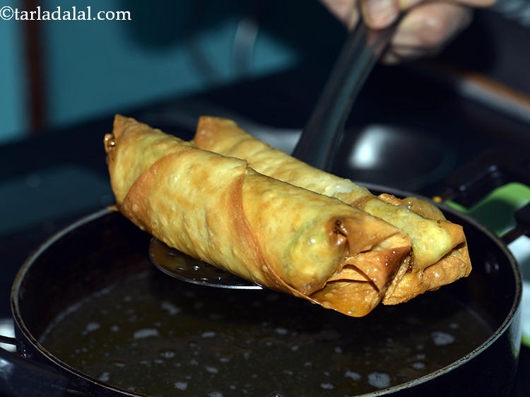 Step 27 – Fry till&nbsp;<strong>Spring Roll, Veg Spring Roll</strong>&nbsp;turn golden brown in colour from all the sides.