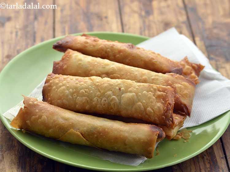 Step 28 – Drain on an absorbent paper.&nbsp;Remove the <strong>fried</strong> <strong>Spring roll</strong> in a plate.