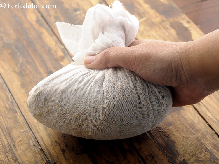 Step 11 – Lift all the sides of the muslin cloth towards the centre and twist it and …