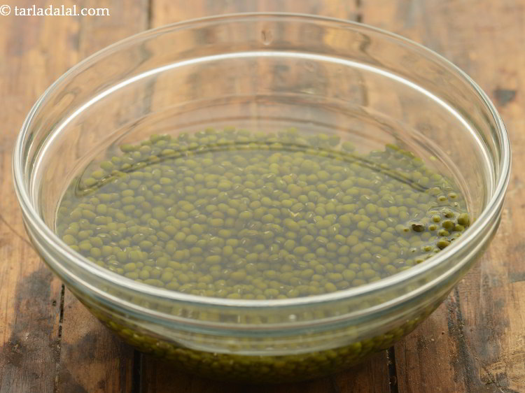 स्टेप 42 – एक गहरे कटोरे में लगभग १/३ कप मूंग लें।