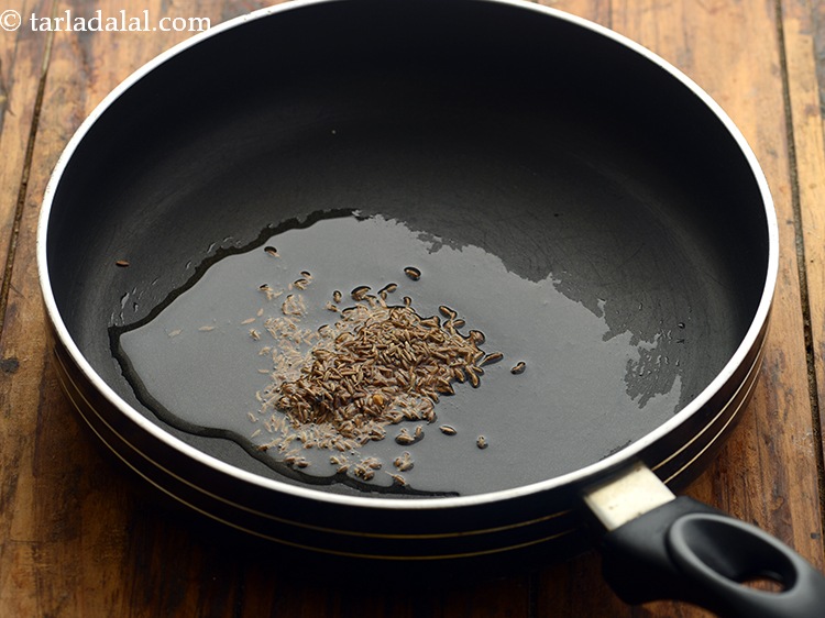 Step 14 – To make <strong>sprouted matki poha</strong>, heat the oil in a broad non-stick pan. Once the …