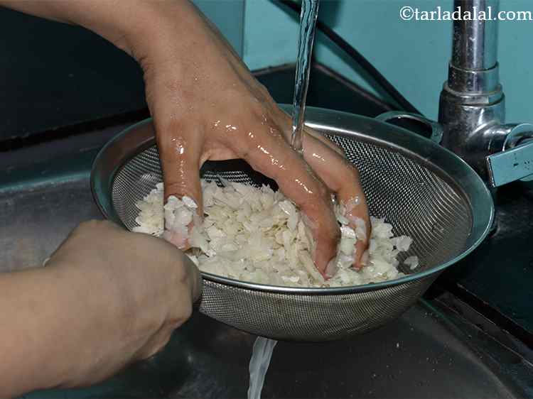 Step 12 – Place the beaten rice on a sieve under a running tap and wash lightly to …