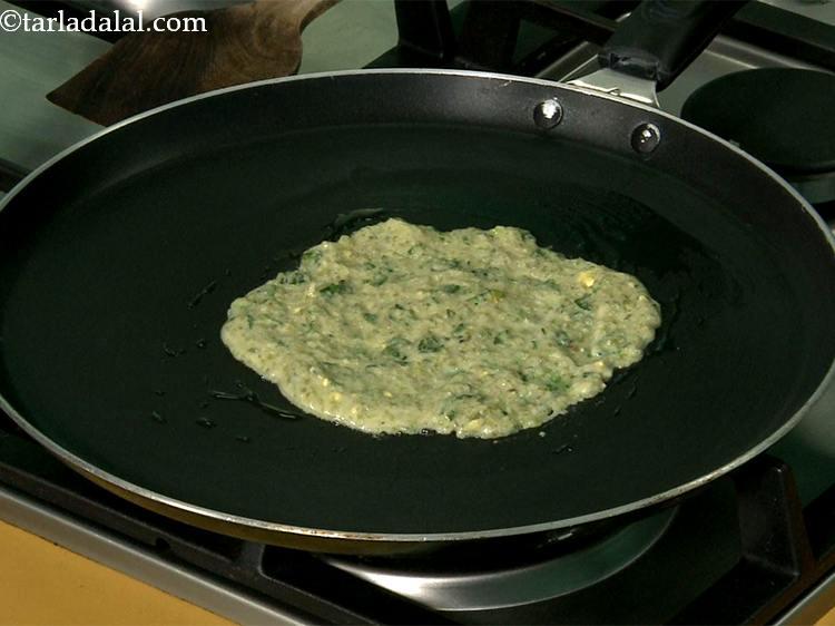 Step 19 – Spread it evenly, using a ladle to make a 125 mm (5&rdquo;) diameter thin circle.