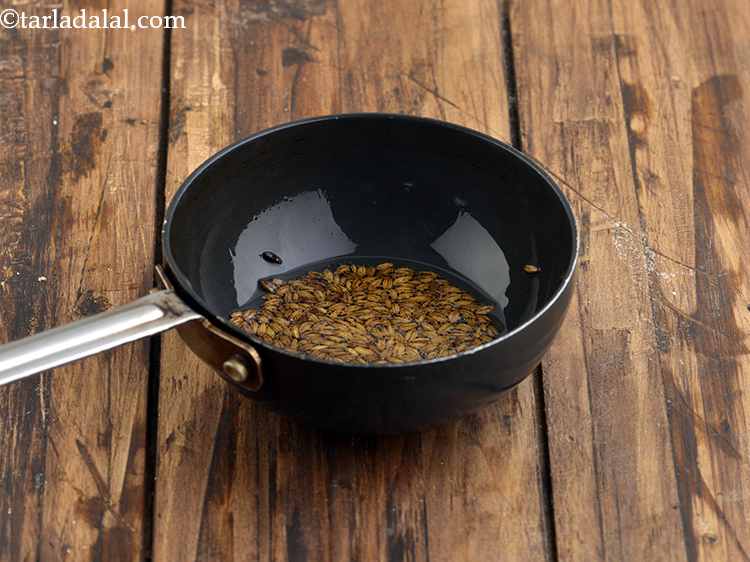 Step 12 – Once the oil is hot, add the cumin seeds.