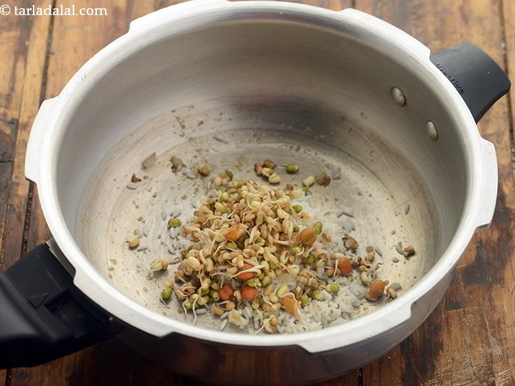 Step 18 – Along with this also add mixed sprouts to make <strong>healthy sprouts khichdi for toddlers</strong>. You …