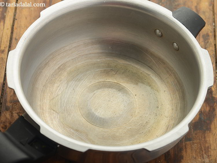 Step 10 – Now to make <strong>mixed sprouts khichdi for babies</strong> begin by tempering the khichdi. For that …