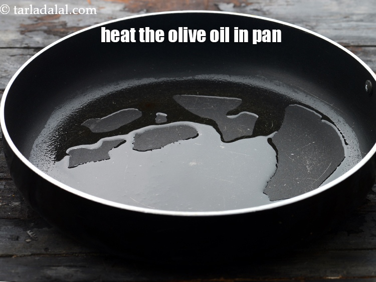 Step 3 – Heat 2 tsp&nbsp;<a href="https://www.tarladalal.com/glossary-olive-oil-451i">olive oil</a>&nbsp;in broad non-stick pan.&nbsp;