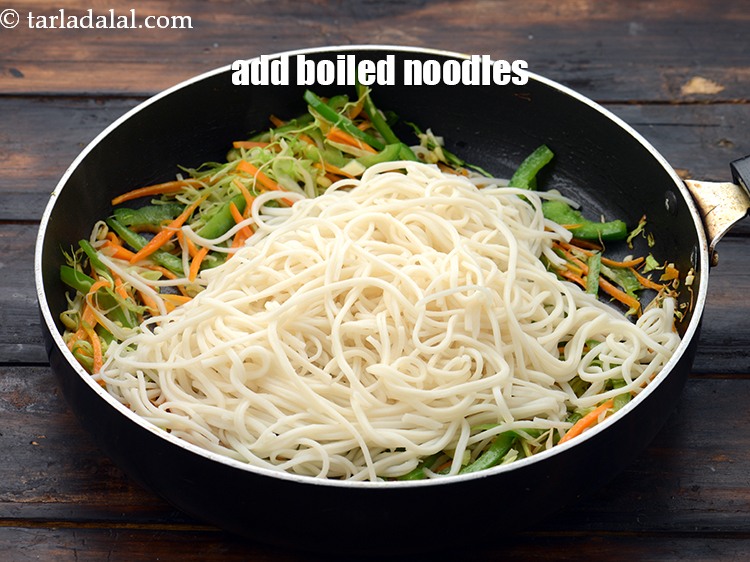 Step 25 – Add 2 cups&nbsp;<a href="https://www.tarladalal.com/boiled-noodles-4183r">boiled noodles</a>.&nbsp;