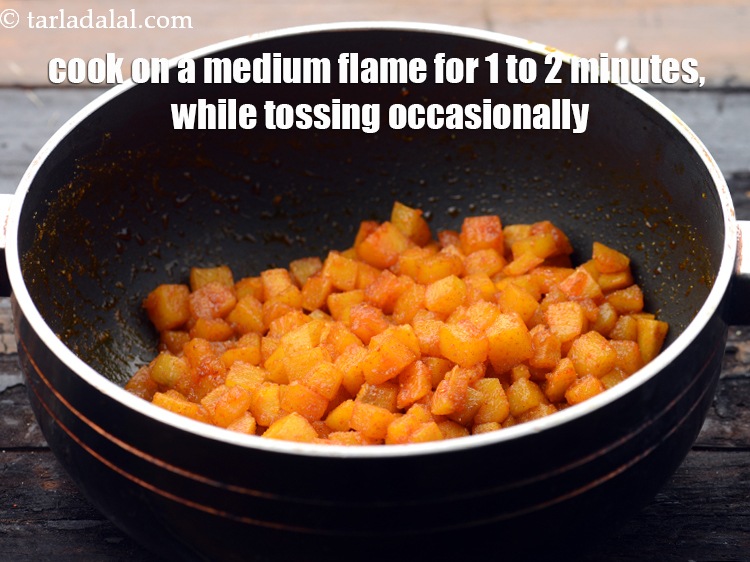 Step 15 – Cook on a medium flame for 1 to 2 minutes, while tossing occasionally.