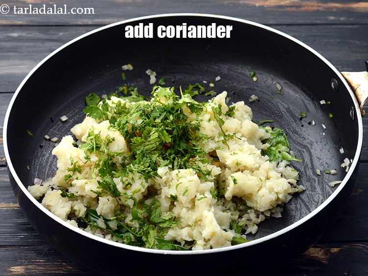 Step 16 – Add 2 tbsp&nbsp;finely&nbsp;<a href="https://www.tarladalal.com/glossary-chopped-coriander-783i">chopped coriander (dhania)</a>.