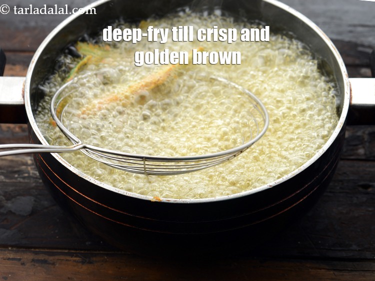 Step 19 – Deep-fry the bhindi till they turn crisp and golden brown in colour from all the …