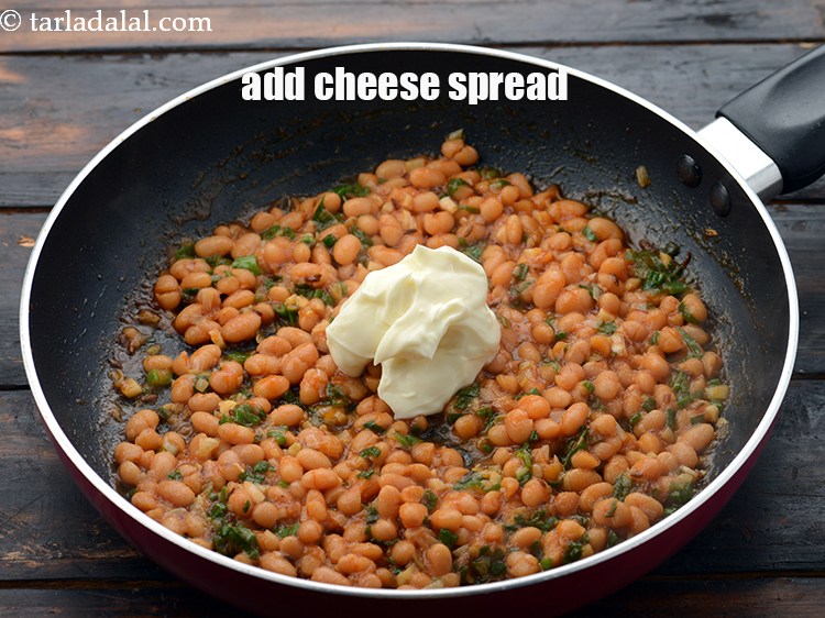 Step 13 – Add 1/4 cup&nbsp;<a href="https://www.tarladalal.com/glossary-cheese-spread-309i">cheese spread</a>.