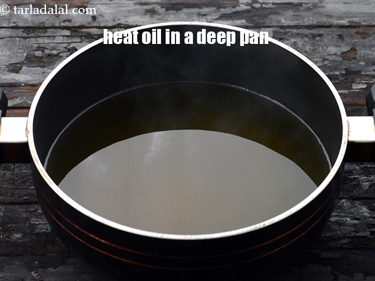 Step 13 – <p>Heat the oil in a deep non-stick pan.</p>
