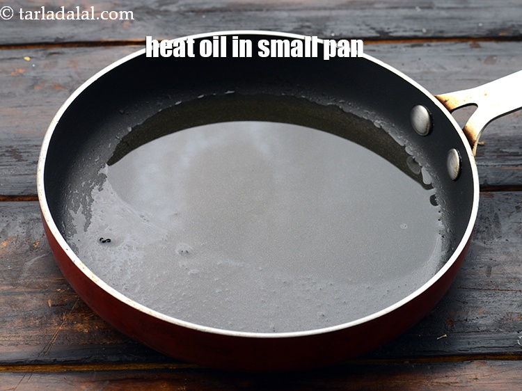 Step 21 – Meanwhile, heat 1 tbsp&nbsp;<a href="https://www.tarladalal.com/glossary-oil-671i">oil</a>&nbsp;in a small broad non-stick pan. You can also use ghee. …