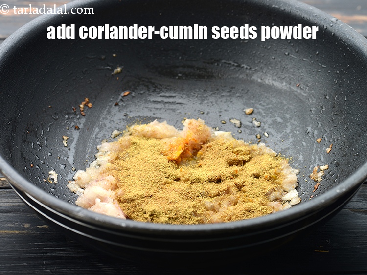 Step 32 – Add 2 tbsp&nbsp;<a href="https://www.tarladalal.com/glossary-coriander-cumin-seeds-powder-dhania-jeera-powder-375i">coriander-cumin seeds (dhania-jeera) powder</a>.&nbsp;
