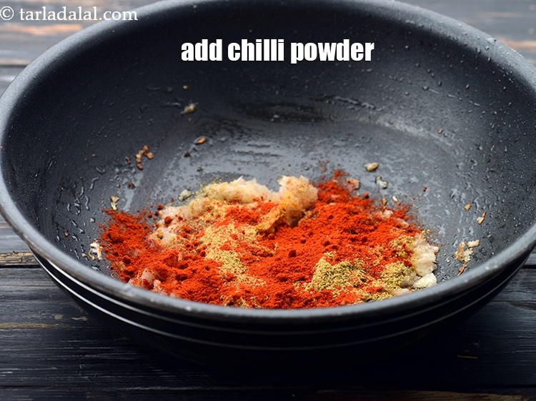 Step 33 – Add 2 tsp&nbsp;<a href="https://www.tarladalal.com/glossary-chilli-powder-red-chilli-powder-339i">chilli powder</a>.&nbsp;