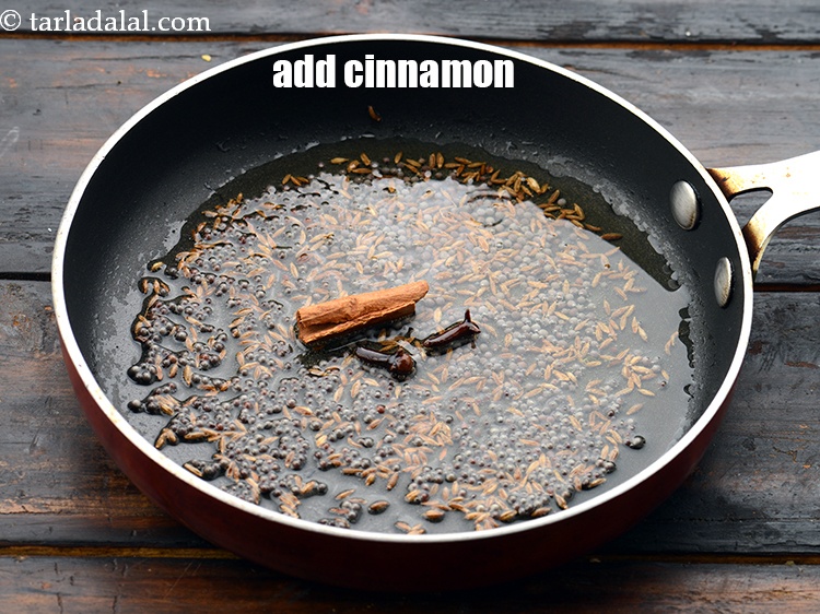 Step 25 – Add 1&nbsp;small stick&nbsp;<a href="https://www.tarladalal.com/glossary-cinnamon-dalchini-346i">cinnamon (dalchini)</a>.