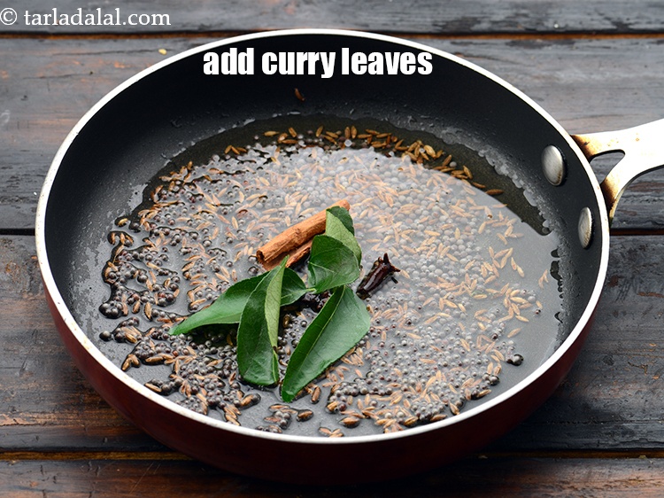 Step 26 – Add&nbsp;4 to 5&nbsp;<a href="https://www.tarladalal.com/glossary-curry-leaves-kadi-patta-kadipatta-388i">curry leaves (kadi patta)</a>.