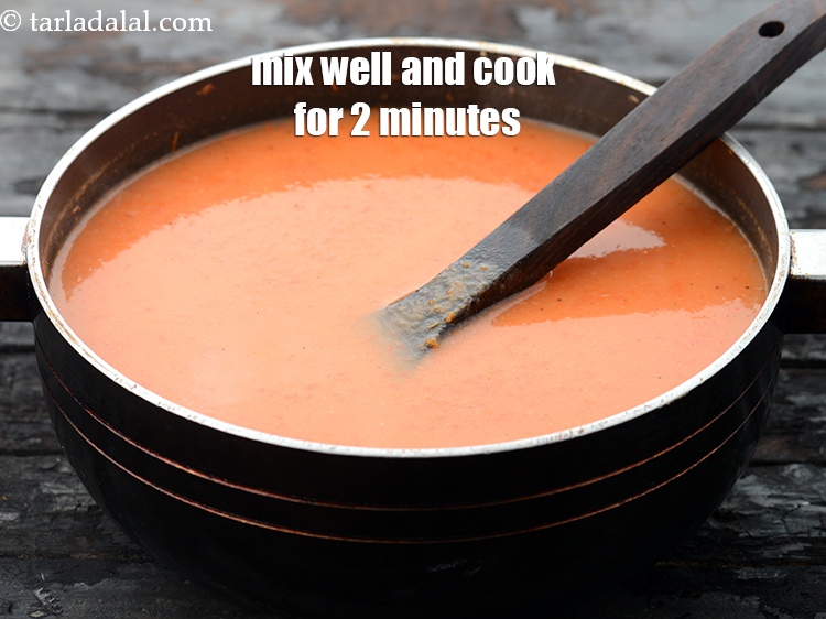 Step 28 – Mix well and cook on a medium flame for 2 minutes, while stirring continuously.