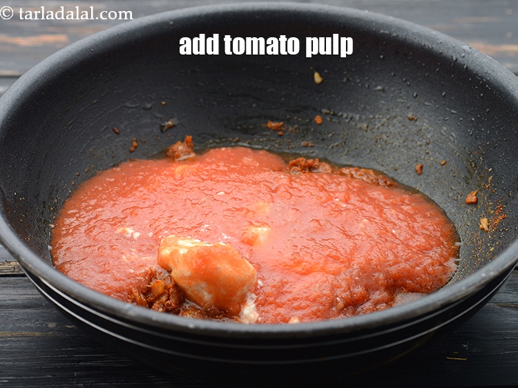 Step 37 – Add 3/4 cup&nbsp;fresh&nbsp;<a href="https://www.tarladalal.com/glossary-tomato-pulp-tamatar-ka-pulp-1039i">tomato pulp</a>.&nbsp;