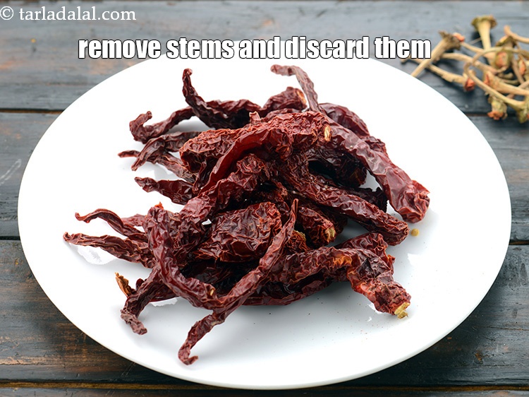Step 4 – Remove the stems of the Kashmiri red chillies and discard the stem.