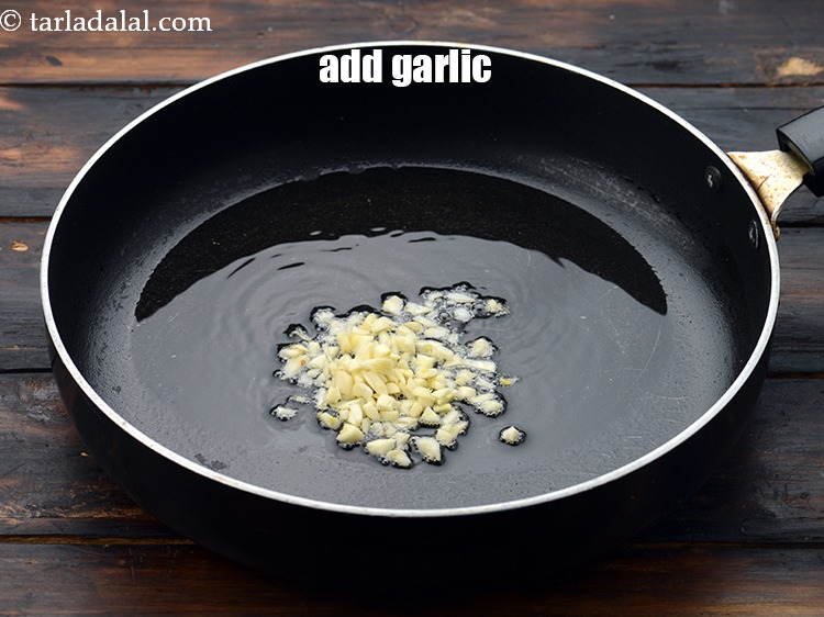 Step 17 – Add 1&nbsp;tbsp&nbsp;finely&nbsp;<a href="https://www.tarladalal.com/glossary-chopped-garlic-790i">chopped garlic (lehsun)</a>.&nbsp;This gives a great taste and always use chopped.&nbsp;