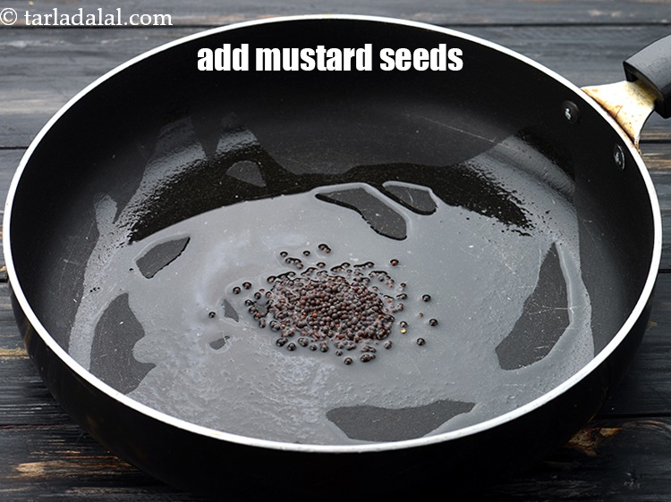 Step 8 – Add 1 tsp&nbsp;<a href="https://www.tarladalal.com/glossary-mustard-seeds-sarson-rai-sarson-ke-beej-525i">mustard seeds ( rai / sarson)</a>.&nbsp;