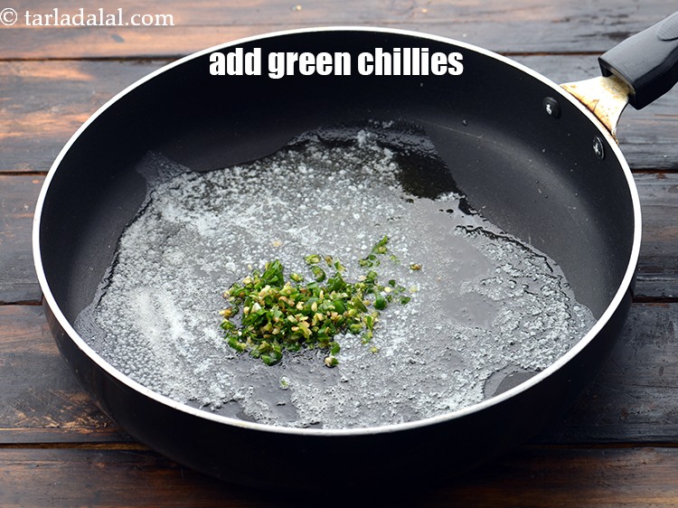 Step 4 – Add 2 tsp&nbsp;finely&nbsp;<a href="https://www.tarladalal.com/glossary-chopped-green-chilli-820i">chopped green chillies</a>.