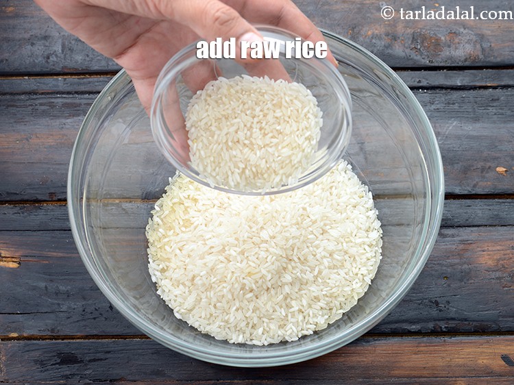 Step 4 – Add 1/2 cup&nbsp;raw&nbsp;<a href="https://www.tarladalal.com/glossary-rice-chawal-533i">rice (chawal)</a>.&nbsp;