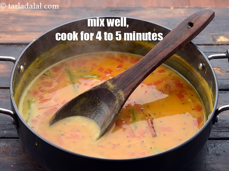 Step 31 – Mix the dal well and continue cooking on a medium flame for 4 to 5 …