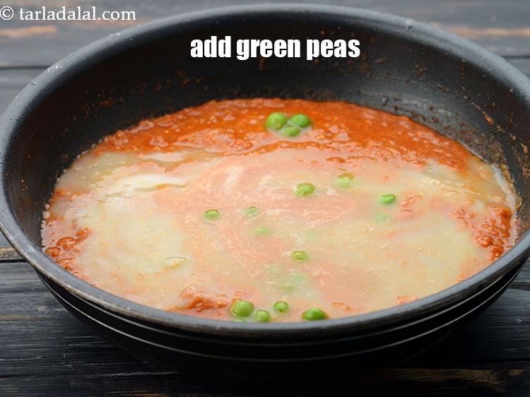 Step 43 – Add 1/2 cup&nbsp;<a href="https://www.tarladalal.com/glossary-boiled-green-peas-1078i">boiled green peas</a>.&nbsp;