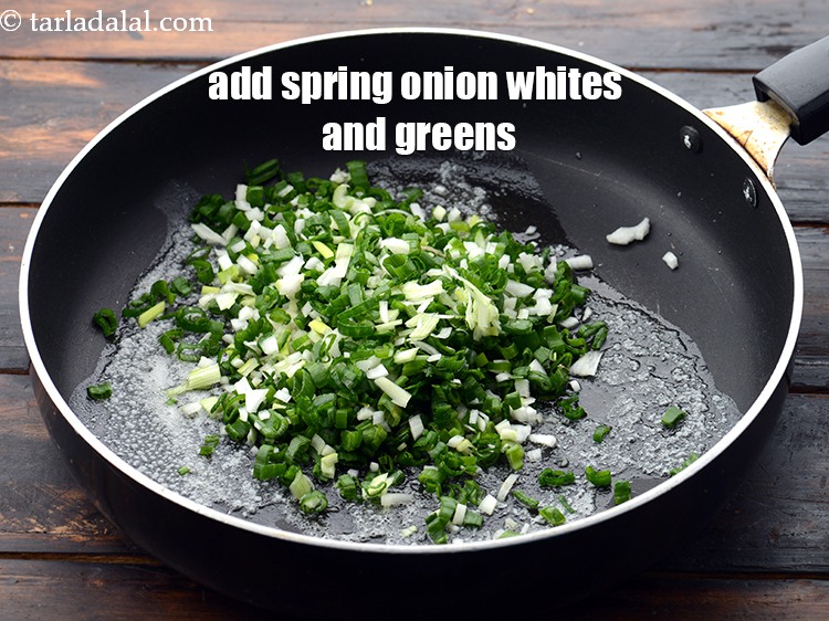 Step 5 – Add 3/4 cup&nbsp;finely&nbsp;<a href="https://www.tarladalal.com/glossary-chopped-spring-onions-1575i">chopped spring onions whites and greens</a>.