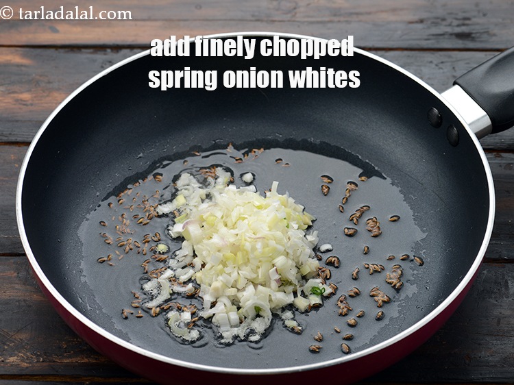 Step 6 – Also add 1/4 cup&nbsp;finely&nbsp;<a href="https://www.tarladalal.com/glossary-chopped-spring-onion-whites-815i">chopped spring onions whites</a>.