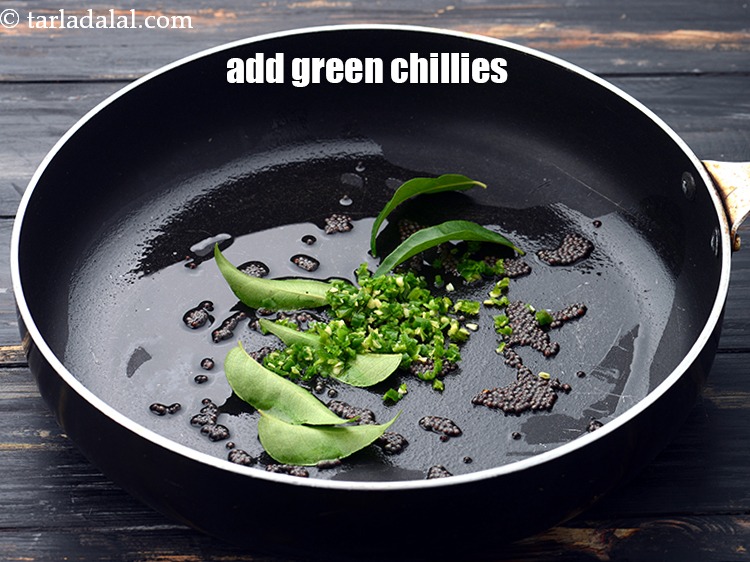 Step 10 – Add 2 tsp&nbsp;finely&nbsp;<a href="https://www.tarladalal.com/glossary-chopped-green-chilli-820i">chopped green chillies</a>.&nbsp;