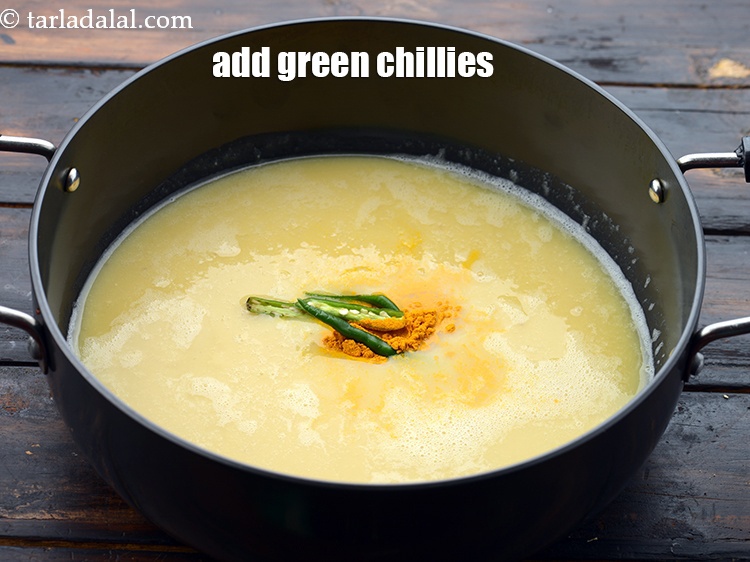 Step 13 – Add 2&nbsp;<a href="https://www.tarladalal.com/glossary-sliced-green-chillies-936i">sliced green chillies</a>
