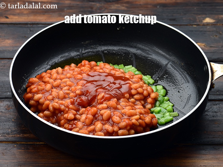 Step 16 – Add 2 tbsp&nbsp;<a href="https://www.tarladalal.com/glossary-tomato-ketchup-tomato-sauce-181i">tomato ketchup</a>.&nbsp;