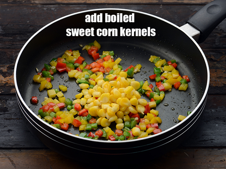 Step 13 – Add 1/4 cup&nbsp;<a href="https://www.tarladalal.com/glossary-boiled-sweet-corn-kernels-153i">boiled sweet corn kernels (makai ke dane)</a>.