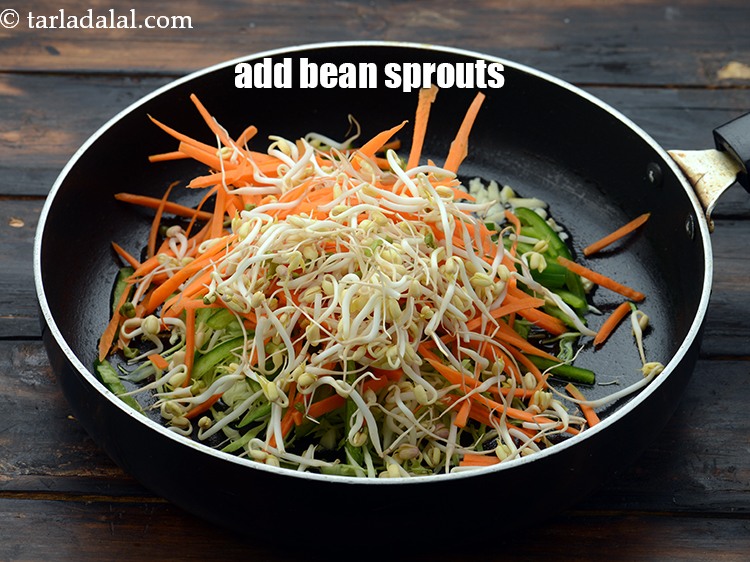 Step 22 – Add 1/2 cup&nbsp;<a href="https://www.tarladalal.com/glossary-bean-sprouts-193i">bean sprouts</a>.&nbsp;