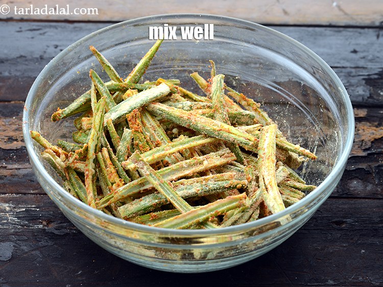 Step 26 – The bhindis have to be fried almost immediately after you mix them, as otherwise they …