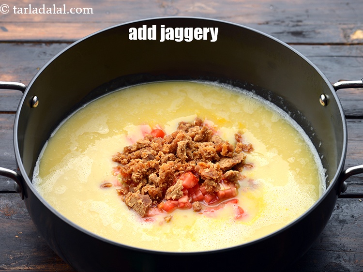 Step 16 – Add 1/4 cup&nbsp;<a href="https://www.tarladalal.com/glossary-chopped-jaggery-946i">chopped jaggery (gur)</a>.