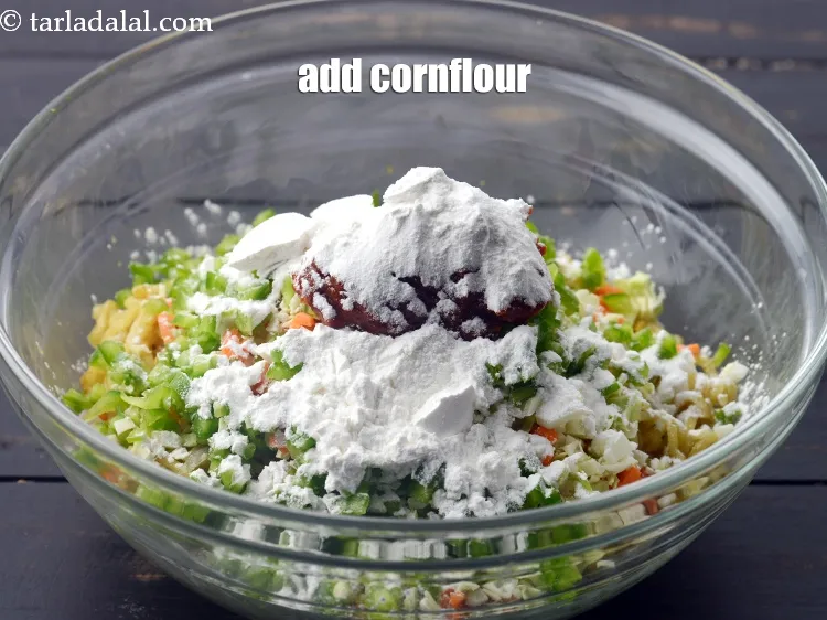 Step 14 – Add 1/4 cup&nbsp;<a href="https://www.tarladalal.com/glossary-cornflour-cornstarch-maize-starch-corn-flour-112i">cornflour</a>.