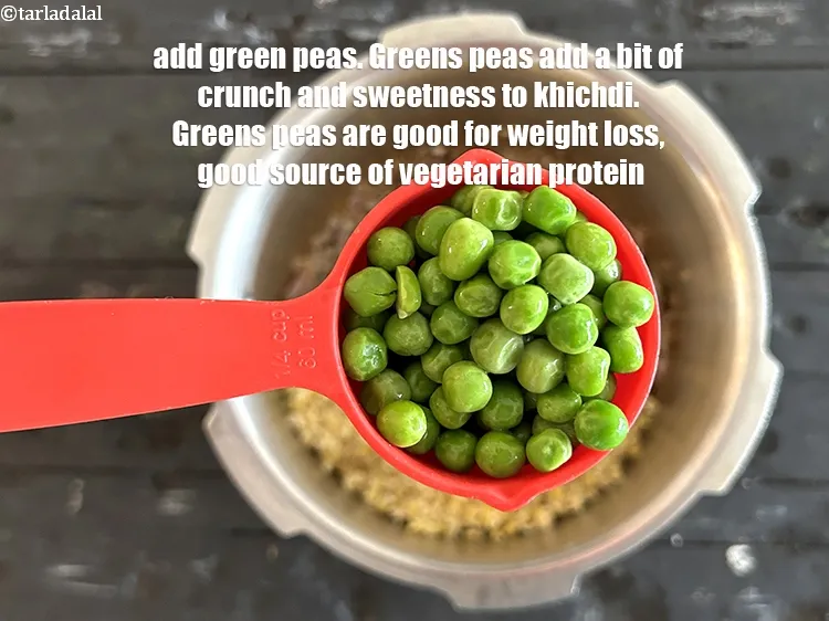 Step 21 – <html><head></head><body><p>Add&nbsp;1/4 cup&nbsp;<a href="glossary-green-peas-matar-hare-matar-vatana-180i">green peas</a>.&nbsp;Green peas add a bit of crunch and sweetness to khichdi. They …