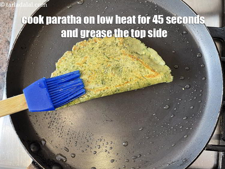 Step 32 – Cook one side of the paratha for 45 seconds.&nbsp;These have to be cooked on a …