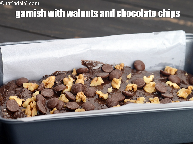 Step 25 – Garnish with walnuts and chocolate chips.