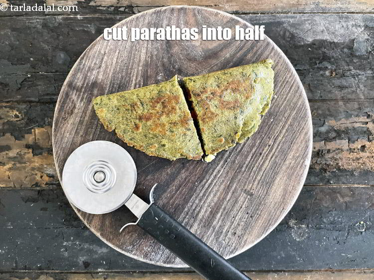 Step 37 – Cut parathas into half.