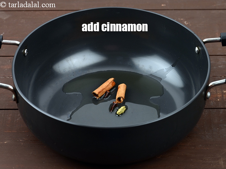 Step 7 – Add&nbsp;2&nbsp;<a href="https://www.tarladalal.com/glossary-cinnamon-dalchini-346i">cinnamon (dalchini)</a>.