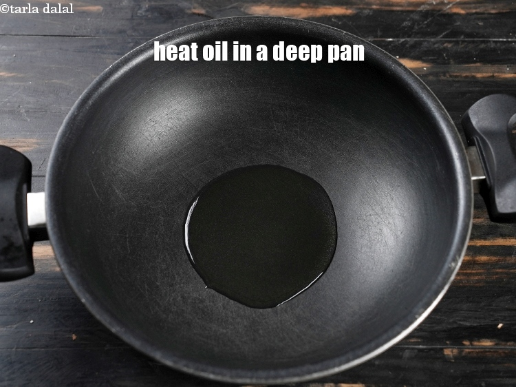 Step 11 – Heat 2 tbsp oil in a deep pan or wok.