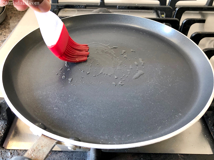 Step 7 – Heat a non stick pan and grease it with a little olive oil with a …